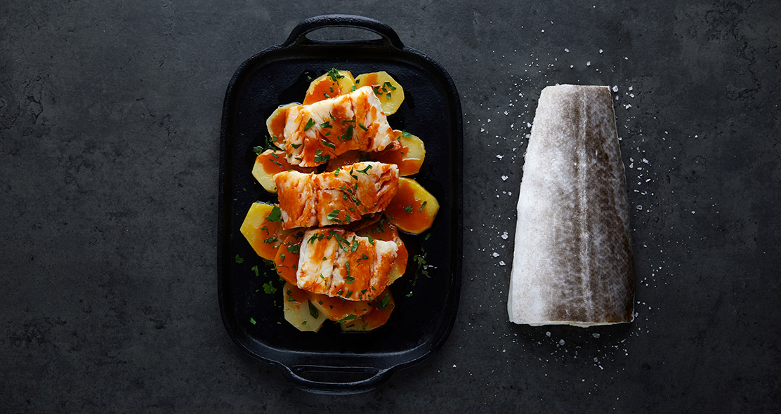Norwegian salted cod with potatoes and paprika